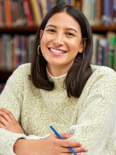 Girl smiling in library