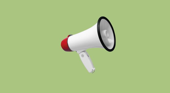 Loudspeaker on green background